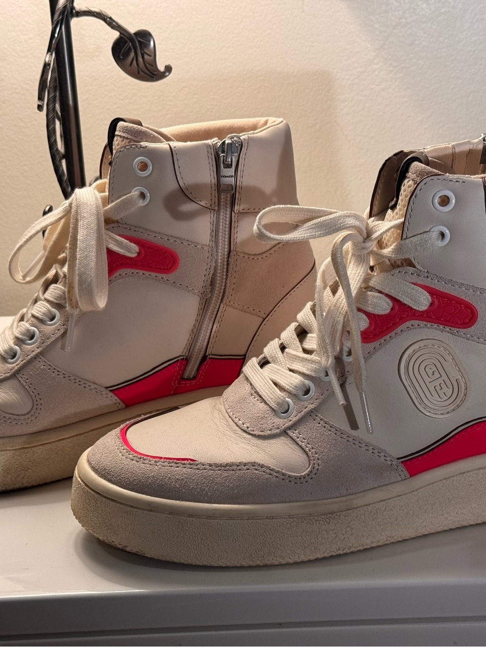 Coach Cream High-Top Sneakers with Pink Accents